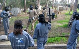  Paintball players planning strategies 